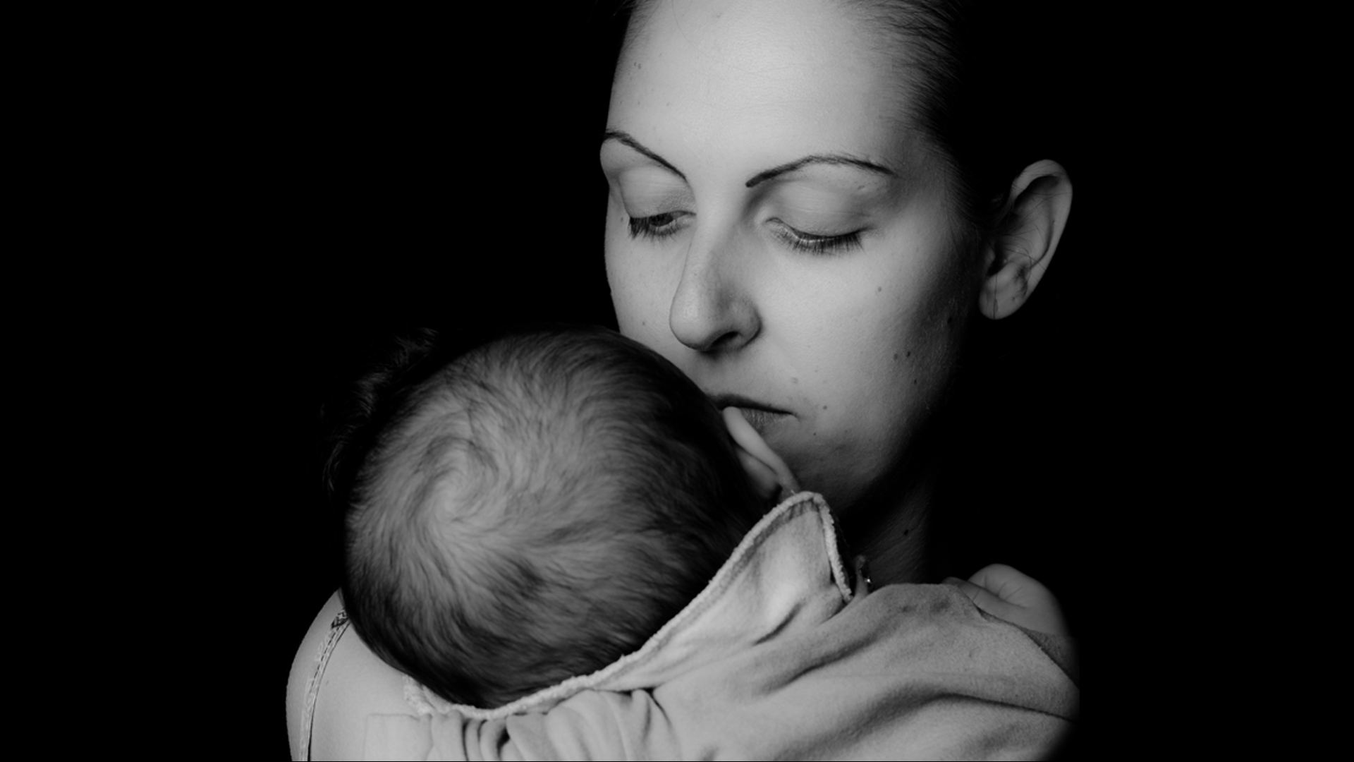 woman-holding-baby